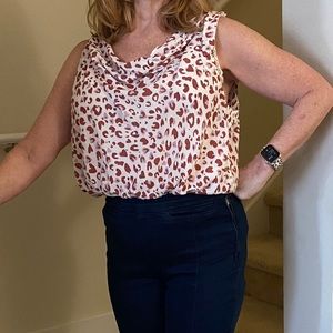 FREE PEOPLE bodysuit print top.  “V” front or back.  Ties above shoulders